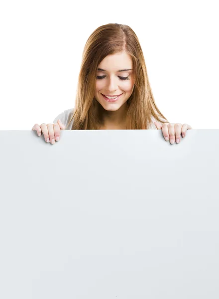 Mulher com uma grande placa em branco — Fotografia de Stock