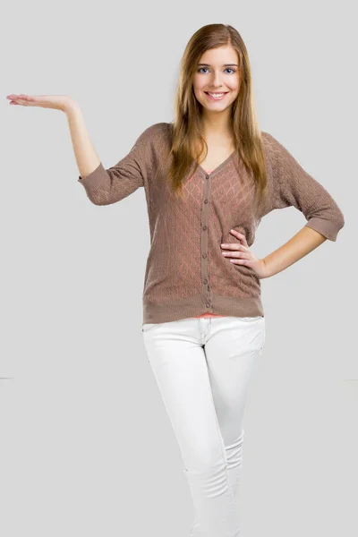 Woman showing something with her hand — Stock Photo, Image