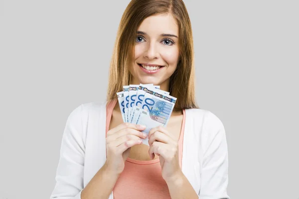 Mooie vrouw bedrijf geld — Stockfoto