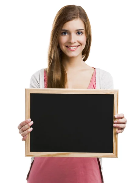 Flicka som håller en svarta tavlan — Stockfoto