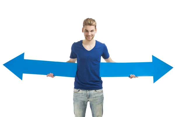 Young man holding  blue arrows — Stock Photo, Image