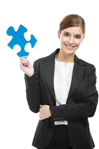 Geschäftsfrau mit Puzzleteil — Stockfoto