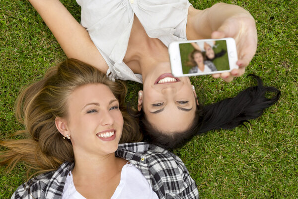 Best friends taking selfies