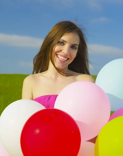 Menina bonita com balões — Fotografia de Stock