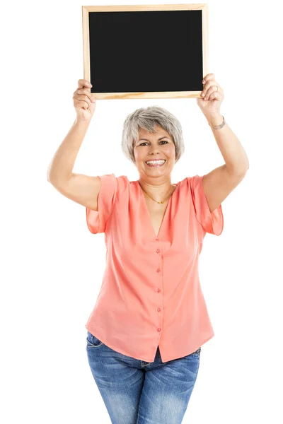 Old woman holding a chalkboard — Stock Photo, Image