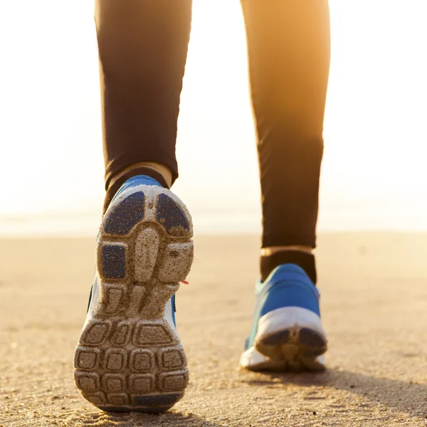 Beautiful woman running — Zdjęcie stockowe