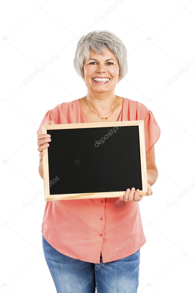 Old woman holding a chalkboard