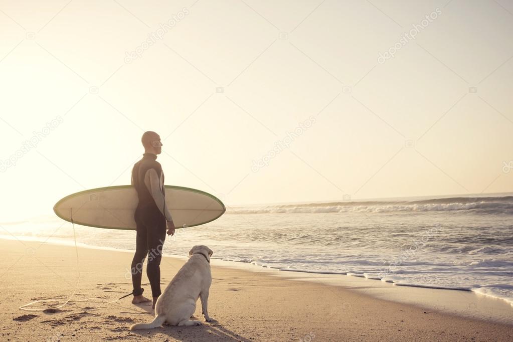 Surfist man and his Dog