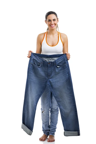 Vrouw met grote jeans — Stockfoto