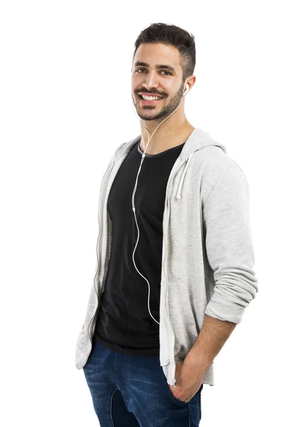 Man smiling and listen music — Stock Photo, Image