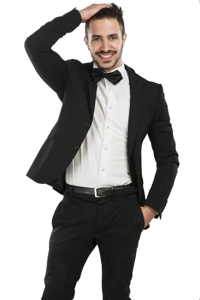 Homem bonito com um smoking — Fotografia de Stock