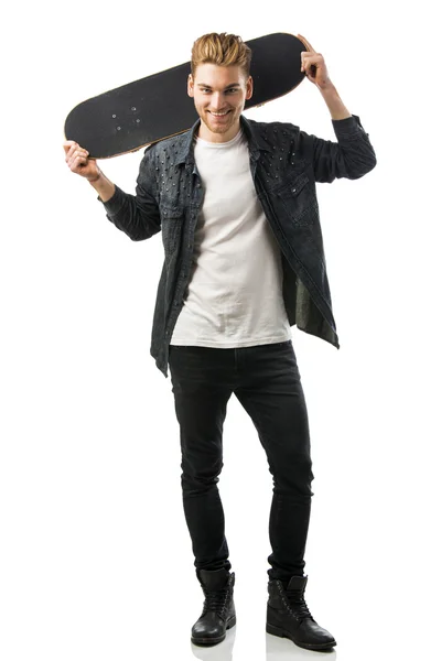 Young man with a skateboard — Stock Photo, Image