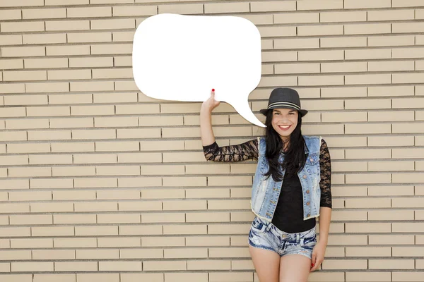 Funny girl holding a thought balloon — Stock Photo, Image