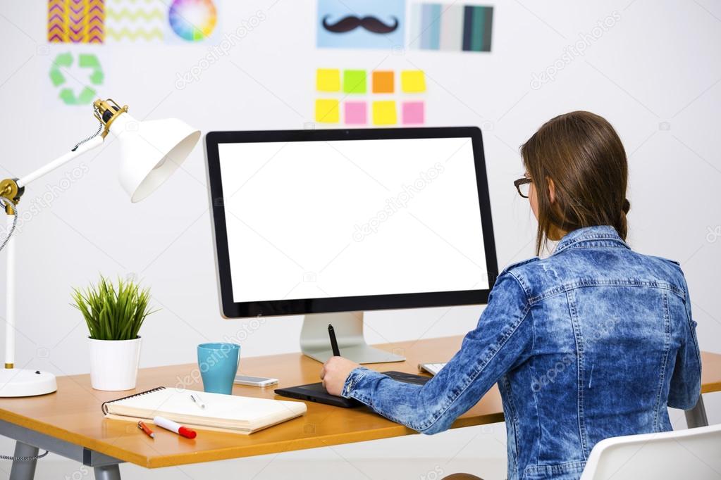 Casual businesswoman  using a computer