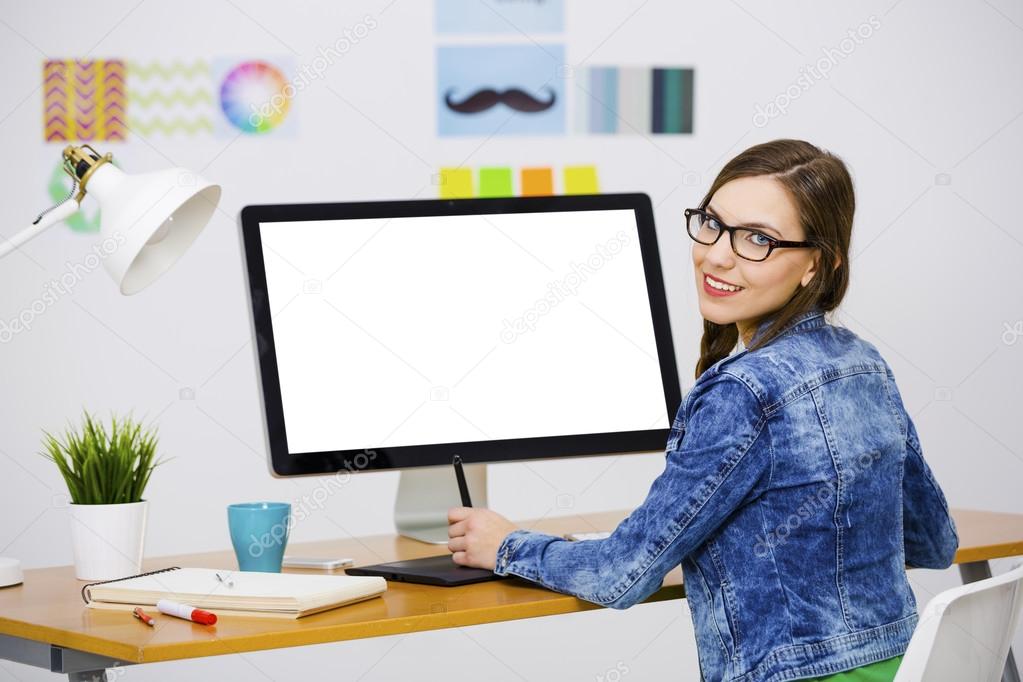 Casual businesswoman  using a computer
