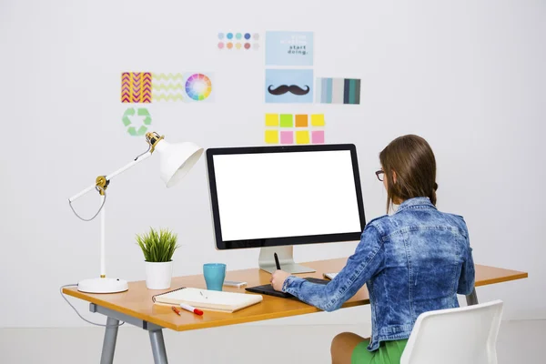 Businesswoman in a creative office — Stock Photo, Image