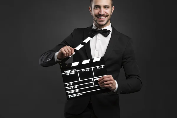 Man holding a clapboard — Stock Photo, Image