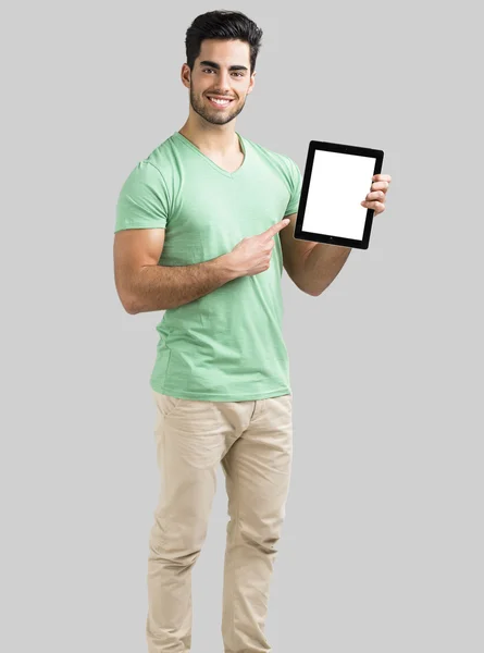 Homme travaillant avec une tablette — Photo