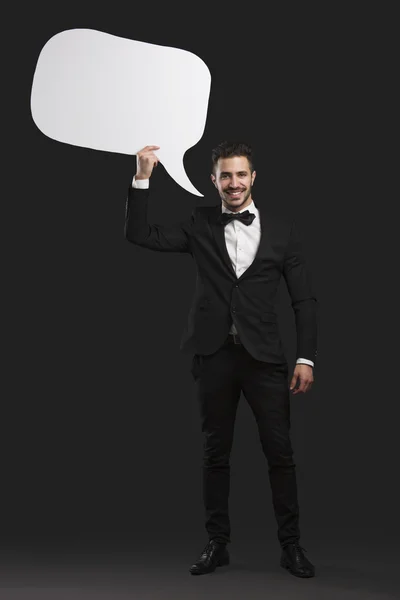 Holding a speach balloon — Stock Photo, Image