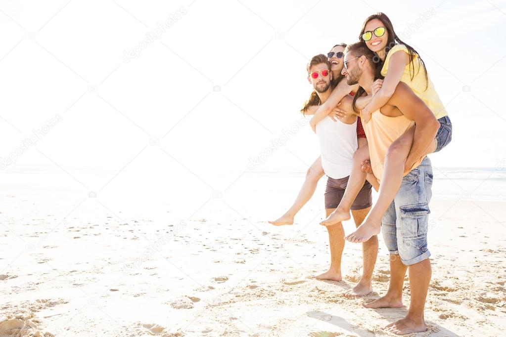 friends having fun at the beach