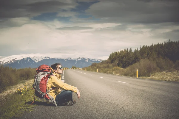 Female backpacker tourist ready for adventure — Stock Photo, Image
