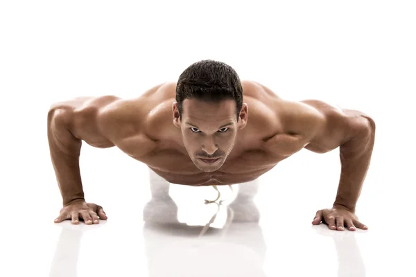 Muscle man making push ups — Stock Photo, Image