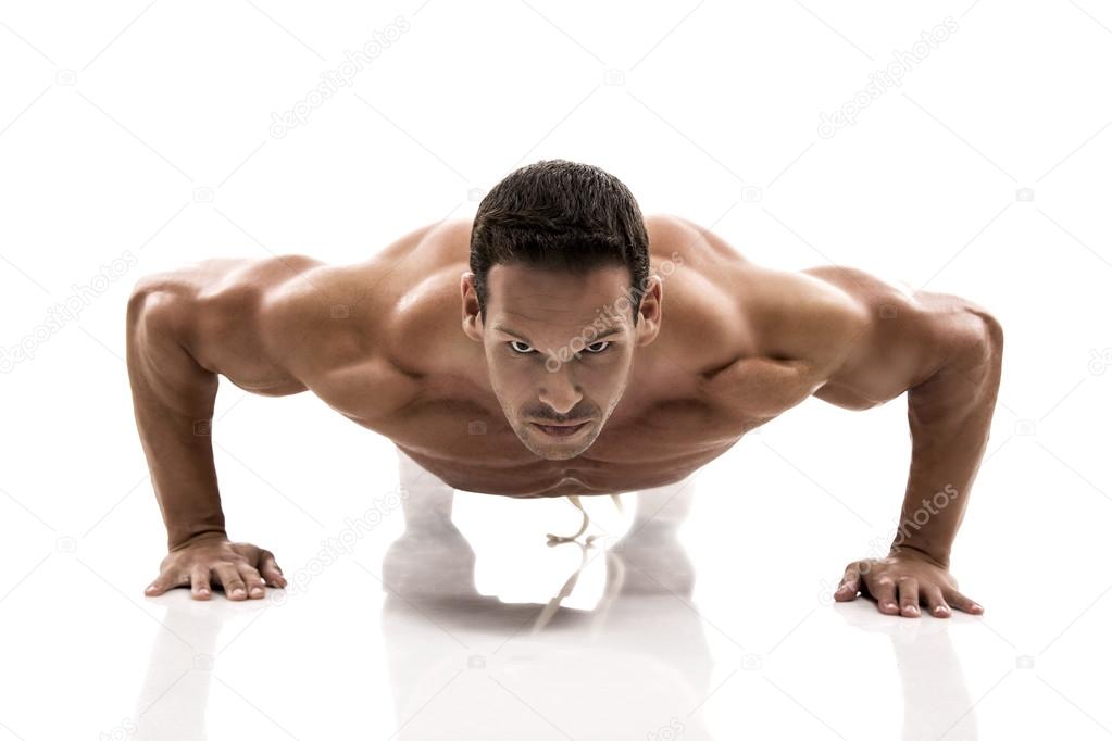 Muscle man making push ups