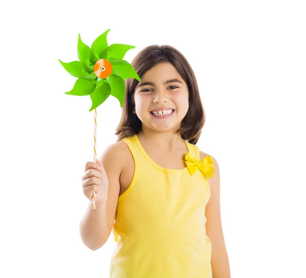 Girl playing with a windmill — Stock Photo, Image