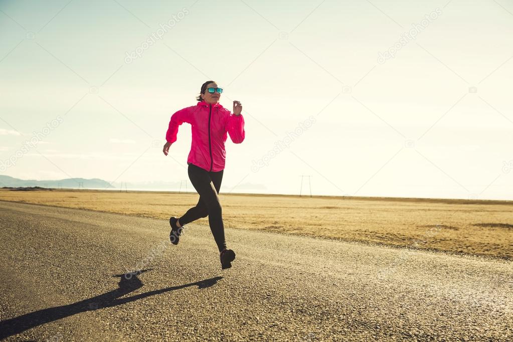 Woman running on a winter day