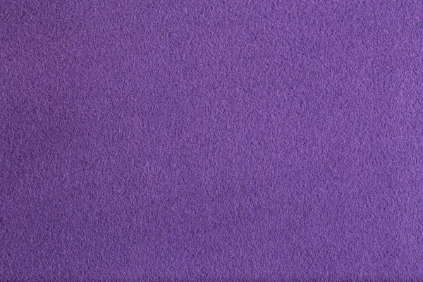 Lila synthetische Fleece flache Textur Nahaufnahme Hintergrund — Stockfoto