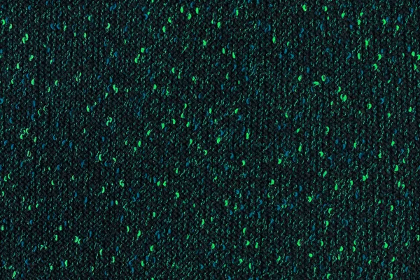 Черный меланж вручную трикотаж ткани с изумрудно-зелеными и голубыми пятнами - бесшовная текстура и плоский фон — стоковое фото