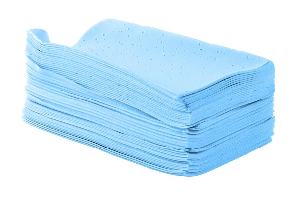 Stack of blue liquidless and powderless laundry detergent squares sheets isolated on white background — Stock Photo, Image