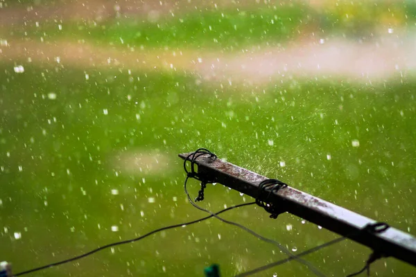 Old balcony clothes drying ropes guide at rainy day close up — Stock Photo, Image