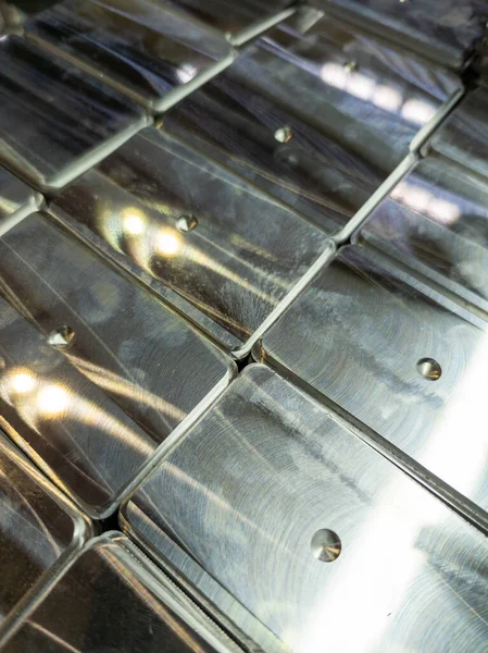 Full frame background of shiny metal tiles after cnc surface milling — Stock Photo, Image