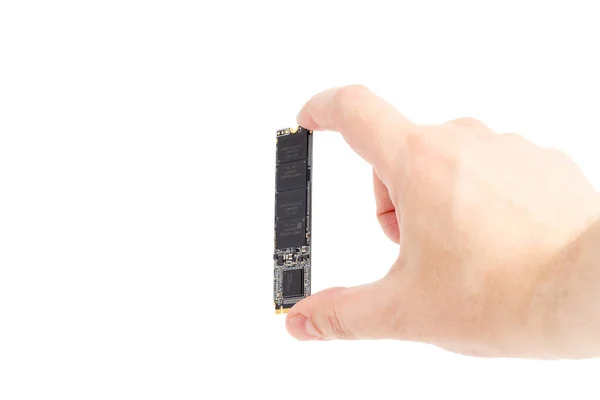 Caucasian hand holding NVME M.2 SSD 2280 3Dnand SLC drive stick isolated on white — Stock Photo, Image