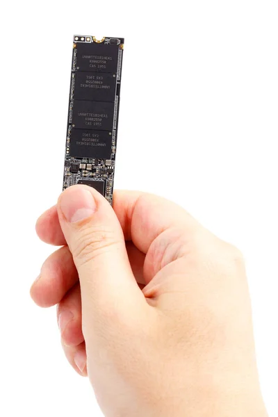 Kaukasische hand houden NVME M.2 SSD 2280 3Dnand SLC drive stick geïsoleerd op wit — Stockfoto