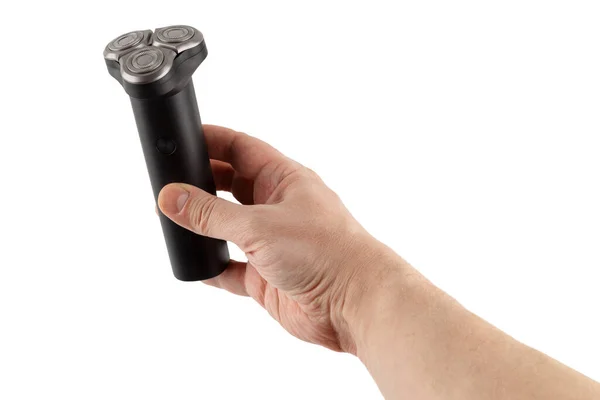 Goła ręka kaukaska trzymająca trzy maszynki do golenia z czarną golarką elektryczną - izolowane — Zdjęcie stockowe