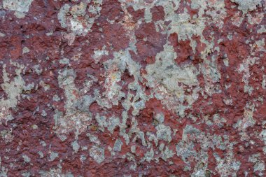 Patlamış mısır üzerine pejmürde kahverengi boya katmanları engebeli beton yüzey - düz zemin ve doku