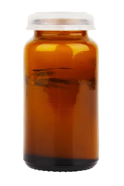 Pequeno jarro de vidro marrom de pomada médica - isolado — Fotografia de Stock