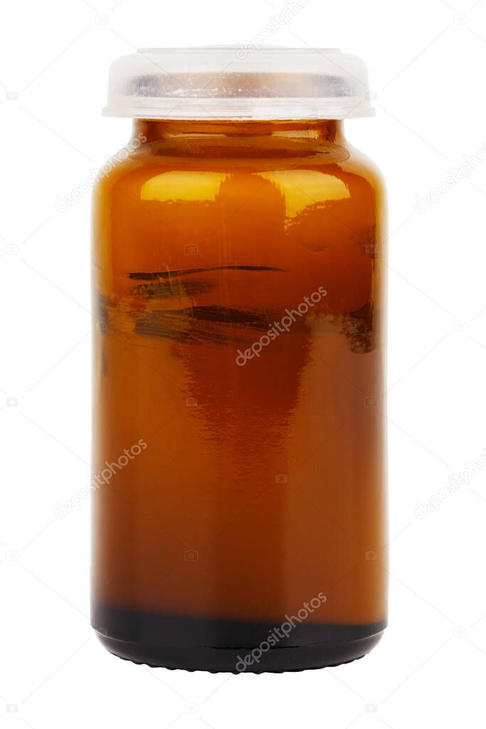 small brown glass jar of medical ointment - isolated