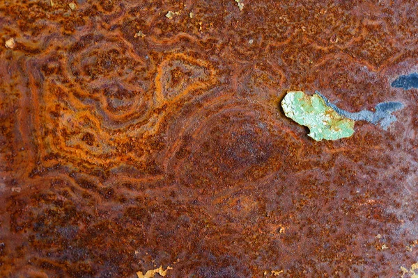 Superfície de ferro plana artisticamente enferrujada com sobras de tinta descascada — Fotografia de Stock