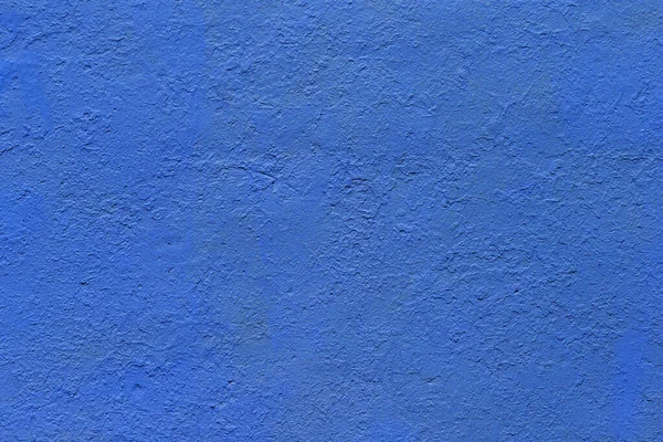 Hintergrund und Struktur der flachen, dick lackierten, mattblauen Oberfläche unter direkter Sonneneinstrahlung — Stockfoto
