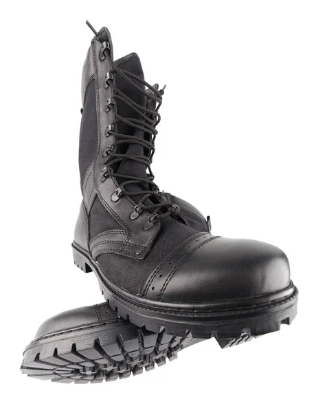 Pár nových černých lehkých vojenských bot izolovaných na bílém pozadí, jeden na druhém — Stock fotografie