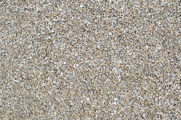 Ballast calcaire blanc sec fond plat plein cadre. Petite texture grise et poussiéreuse de pierres de macadam cassées. — Photo