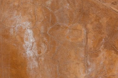 Beyaz tuz lekeli kahverengi alçı duvar dokusu