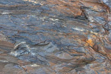 sedimentary rock face texture and background.