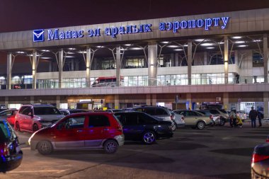 Parking in front of Manas airport in Bishkek, Kyrgyzstan at night - March 18, 2024