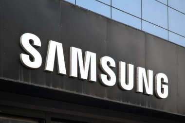 Close-up of the white Samsung logo against a dark background on a TSUM building in Bishkek, Kyrgyzstan - February 25, 2024