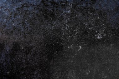 black enameled metal with stains and scratches full-frame background and texture