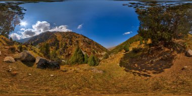 Full Spherical panorama of rocky hiking trail trough picturesque mountain valley at sunny autumn day in equirectangular projection. HDRi after tone mapping.